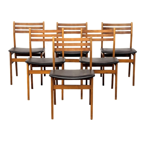 1089 - A mid century teak table and 6 chairs, 168cm x 89cm x 75cm. Extended 211cm x 89cm x 75cm