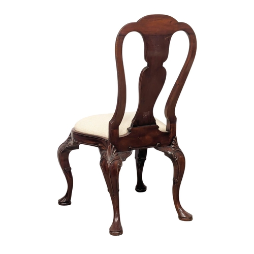 1090 - A set of 7 mahogany George I style dining chairs.