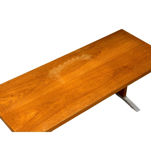 1094 - A Danish Mid Century teak coffee table on chromed feet. 120x48x44cm