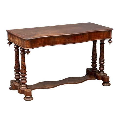 1098 - A Victorian mahogany serpentine front side table with drawer. Circa 1840-1850. 116x52x70