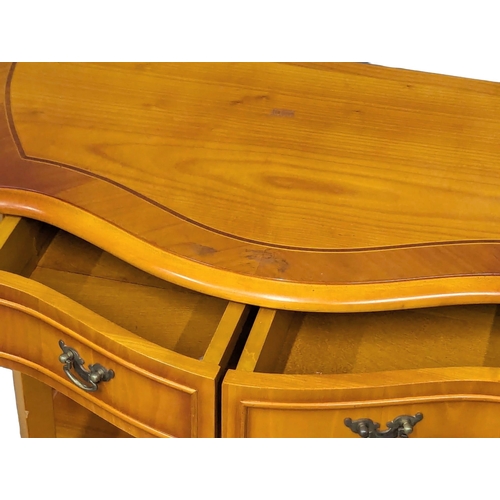 1109 - A yew wood Serpentine front hall table with 2 drawers. 72x35x75xm