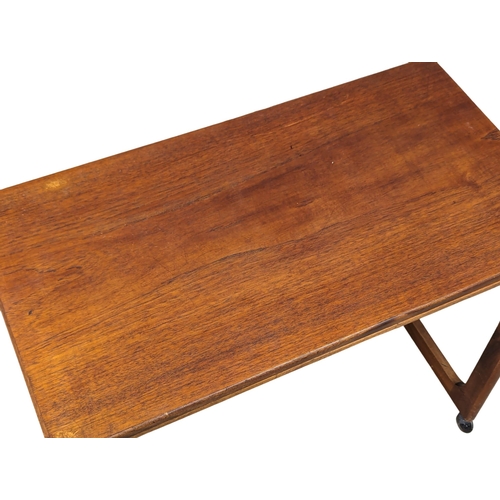 1111 - A McIntosh Mid Century teak 'Triform' turnover coffee table. 76x41x64cm