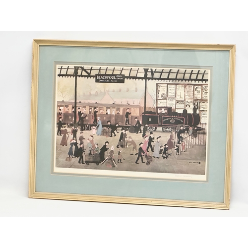 42D - A large signed coloured print by Helen Bradley. Blackpool Station. Signed in pencil. 75x59cm