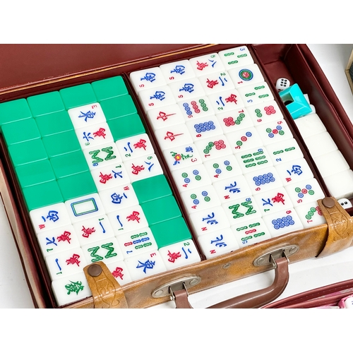 700 - 3 Chinese Mahjong sets in cases.