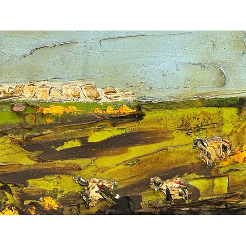 42F - An oil painting on canvas by Colin Flack. Sheep in the Field. 38.5x37.5cm. Frame 53.5x53cm