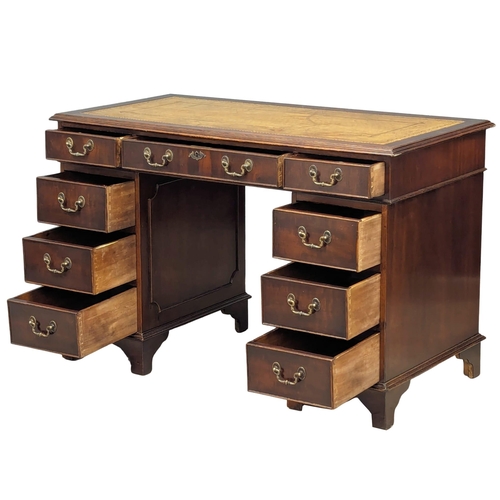 1131 - A George III style mahogany leather top desk, 118cm x 60cm x 77cm