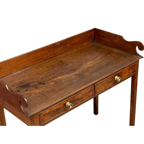 1116 - A late George III mahogany gallery back side table/washstand. Circa 1800-1820. 114x55x89cm