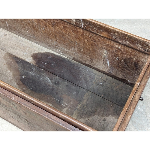 1117 - A large 19th Century trunk. 143x62x59cm