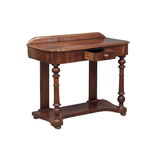 1125 - A Victorian mahogany hall table on turned supports and drawer, circa 1870s. 92cm x 45cm x 76cm