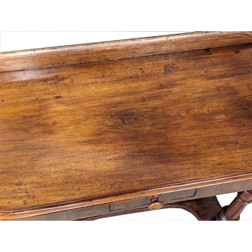 1125 - A Victorian mahogany hall table on turned supports and drawer, circa 1870s. 92cm x 45cm x 76cm