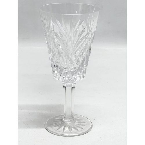 766 - A set of 12 crystal wine glasses. 16.5cm