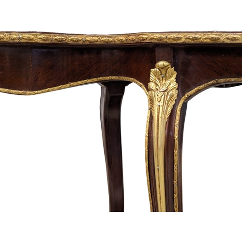 1145 - An Italian inlaid coffee table with brass mounts. 115x67x46cm