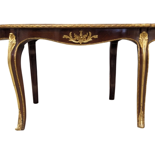 1145 - An Italian inlaid coffee table with brass mounts. 115x67x46cm