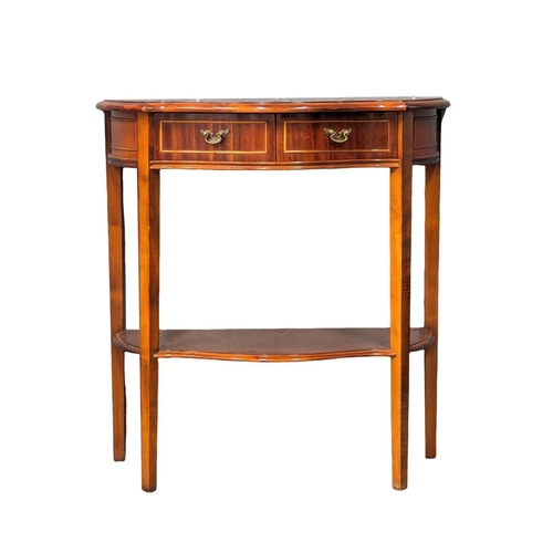 1148 - An inlaid serpentine front side table with 2 drawers. 71x35x75.5cm