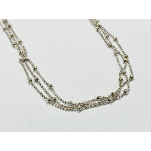 491 - A silver necklace. 0.54g