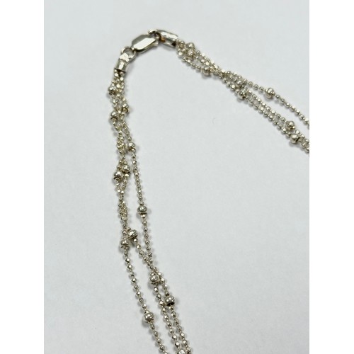 491 - A silver necklace. 0.54g