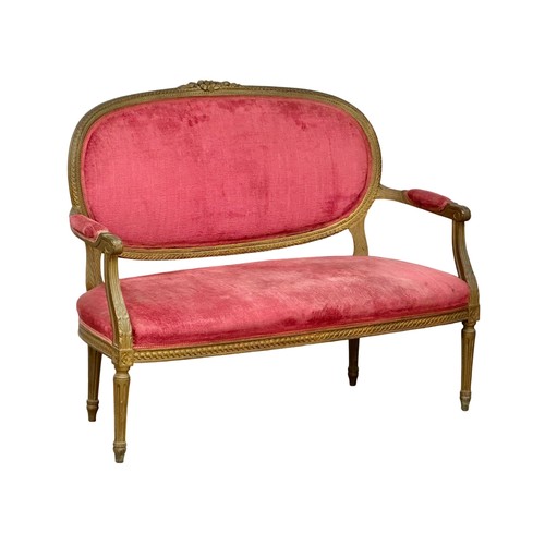 1152 - An Early 20th Century French gilt wood framed 2 seater sofa. Circa 1910-1920.