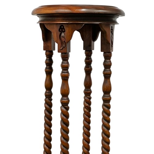 1154 - A pair of tall mahogany jardiniere stands with barley twist supports. 100cm