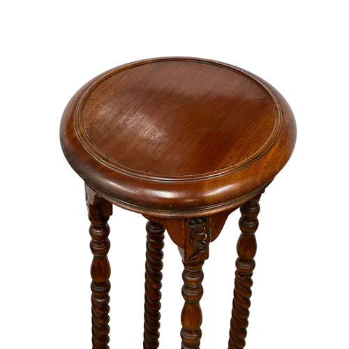 1154 - A pair of tall mahogany jardiniere stands with barley twist supports. 100cm