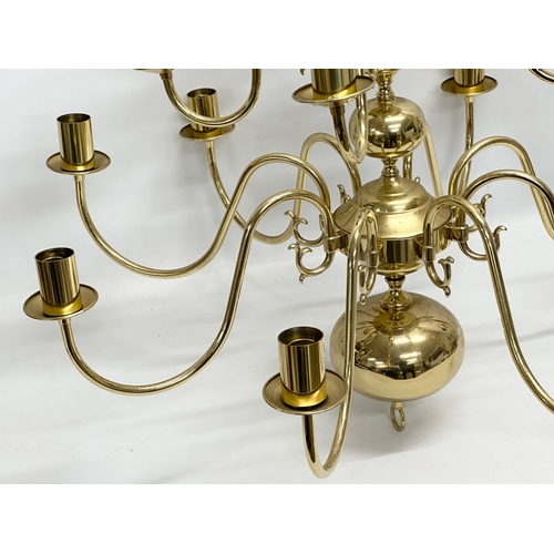 772 - A large brass chandelier. 80x96cm