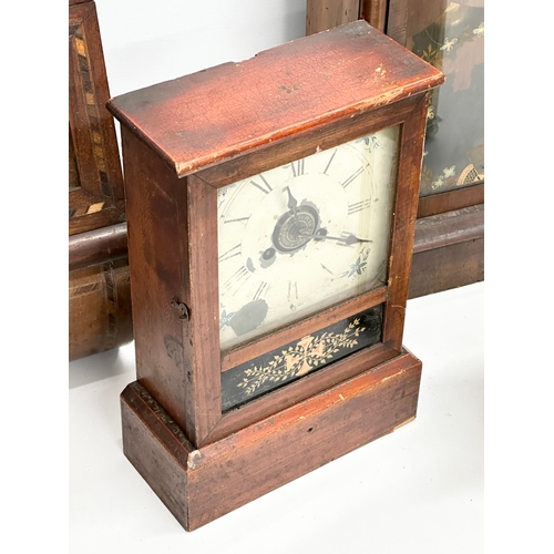 776 - A quantity of Victorian and Edwardian clocks. An inlaid mahogany mantle clock 23x14x31cm. A Late 19t... 