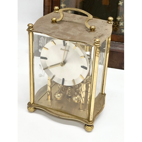 776 - A quantity of Victorian and Edwardian clocks. An inlaid mahogany mantle clock 23x14x31cm. A Late 19t... 