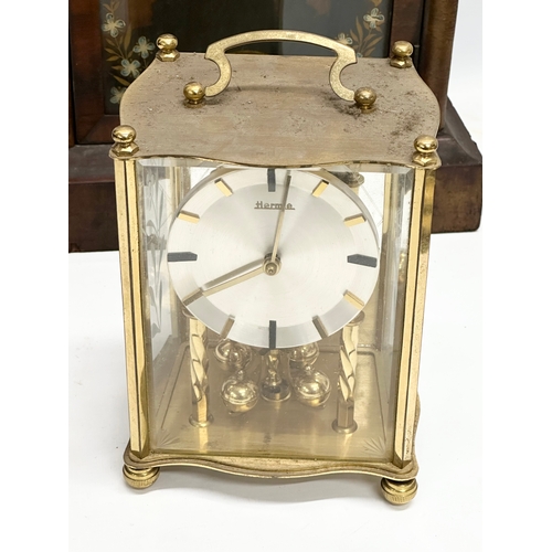 776 - A quantity of Victorian and Edwardian clocks. An inlaid mahogany mantle clock 23x14x31cm. A Late 19t... 