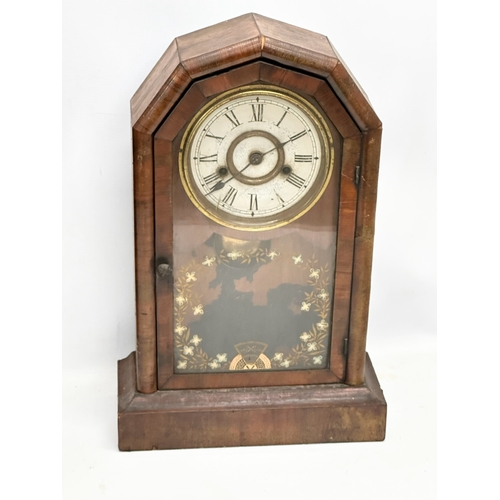 776 - A quantity of Victorian and Edwardian clocks. An inlaid mahogany mantle clock 23x14x31cm. A Late 19t... 