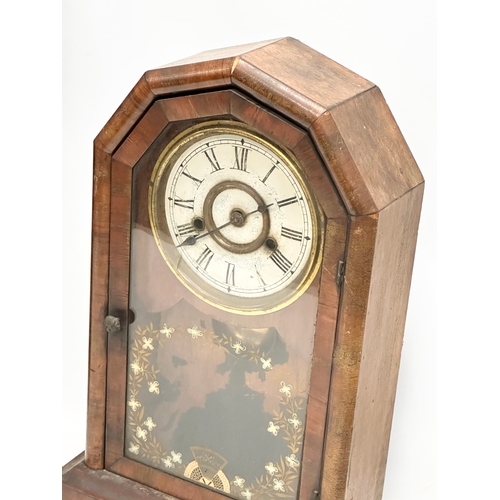 776 - A quantity of Victorian and Edwardian clocks. An inlaid mahogany mantle clock 23x14x31cm. A Late 19t... 