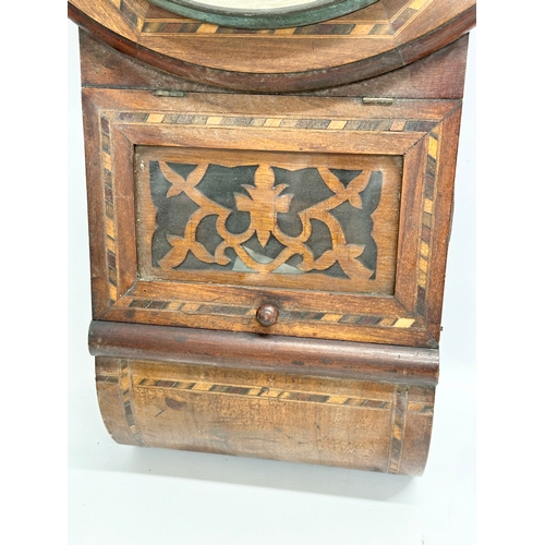 776 - A quantity of Victorian and Edwardian clocks. An inlaid mahogany mantle clock 23x14x31cm. A Late 19t... 