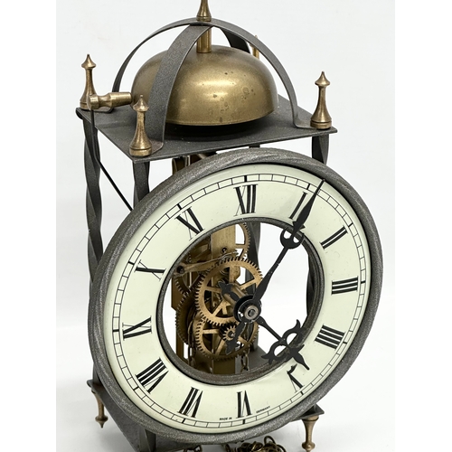 786 - A West German Tempus Fubit skeleton clock. With 1 weight and pendulum. 15x10x25cm