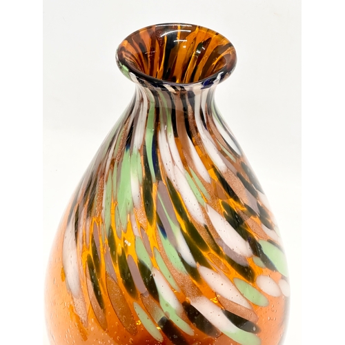 62 - A large Mid 20th Century hand blown splatter amber glass vase. 19x34cm