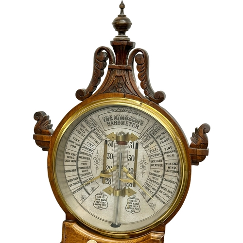 4 - The Atmoscope Barometer. By Admiral Fitzroy. Late 19th Century Victorian oak cased barometer. 37x117... 