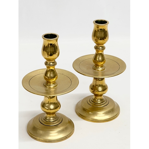 70 - A pair of Early/Mid 20th Century brass candlesticks. 19.5cm