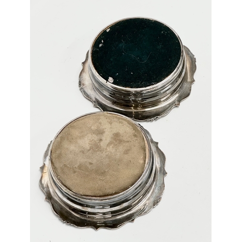 71 - A pair of large 19th Century silver plated bottle coasters. 18x18x5cm