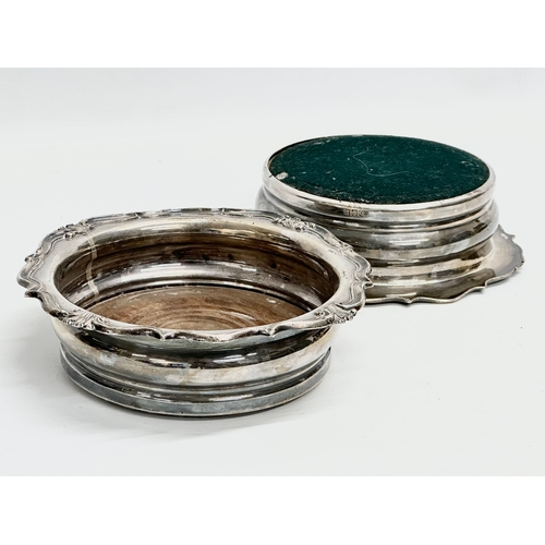 71 - A pair of large 19th Century silver plated bottle coasters. 18x18x5cm