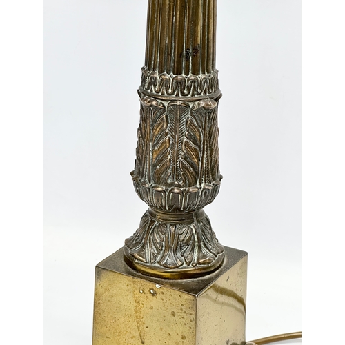 77 - A large Mid 20th Century brass table lamp with reeded column. 64cm