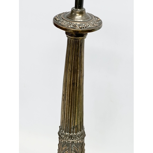 77 - A large Mid 20th Century brass table lamp with reeded column. 64cm