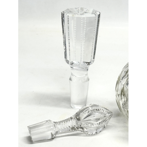 93 - A Late 19th Century Victorian lens cut decanter with 3 stoppers. 29cm