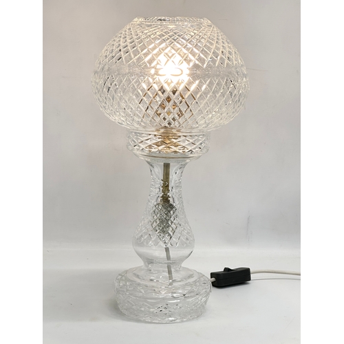 94 - A large vintage 2 piece crystal table lamp. 23x43cm