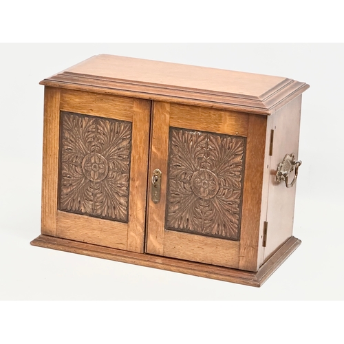 86 - A Late 19th Century Victorian oak tabletop humidor smokers cabinet. 37.5x21x27cm