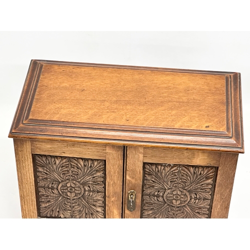 86 - A Late 19th Century Victorian oak tabletop humidor smokers cabinet. 37.5x21x27cm