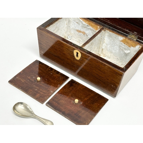 87 - A Regency rosewood sarcophagus tea caddy with nickel silver spoon. Circa 1810. 23x12x14cm