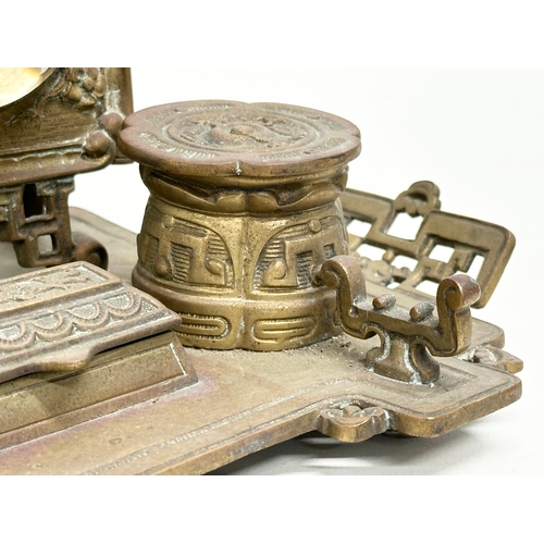 88 - William Tonks. A Late 19th Century W.T & S brass desktop inkstand and clock set in the Chinese style... 