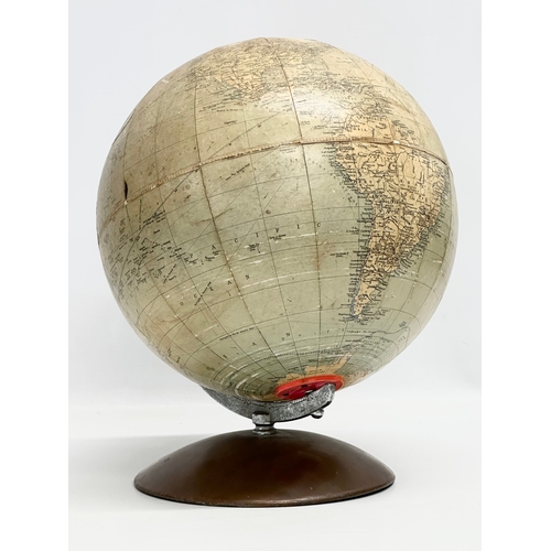 131 - A 1960’s Philips 10’ Challenge Globe on metal base.