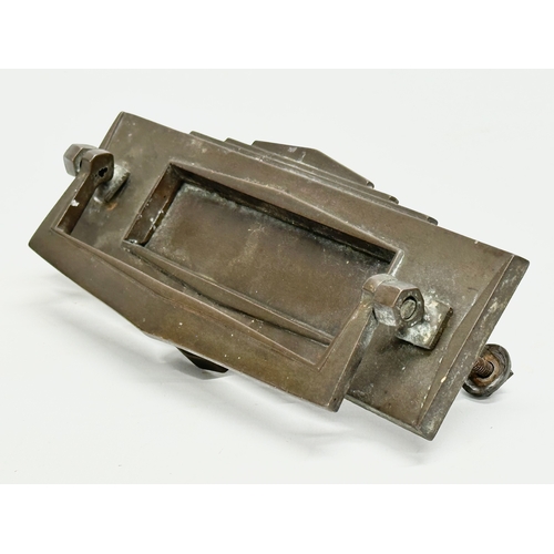 124 - An Art Deco letter slot door knocker. 1930. 23cm