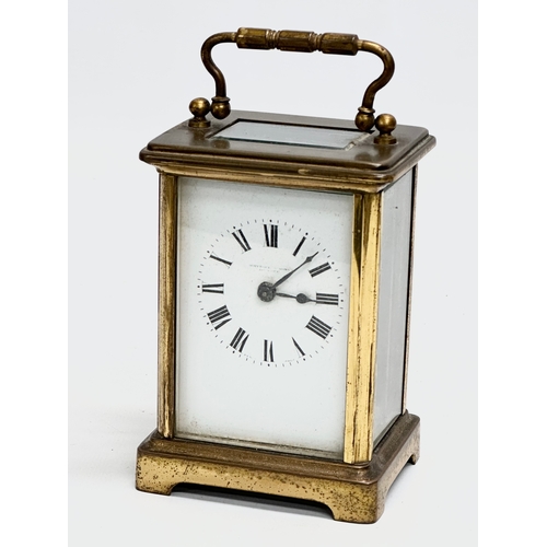 89 - Whytock & Sons. A Late 19th/Early 20th Century brass carriage clock by Whytock & Sons. With original... 