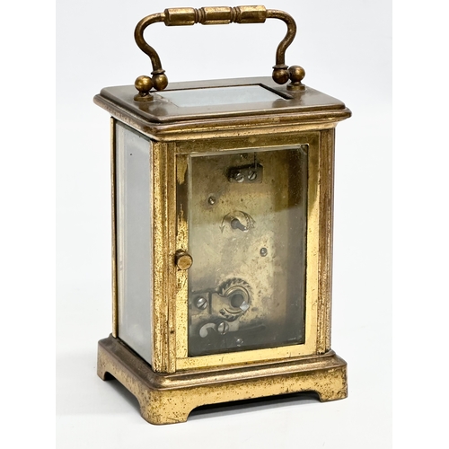 89 - Whytock & Sons. A Late 19th/Early 20th Century brass carriage clock by Whytock & Sons. With original... 