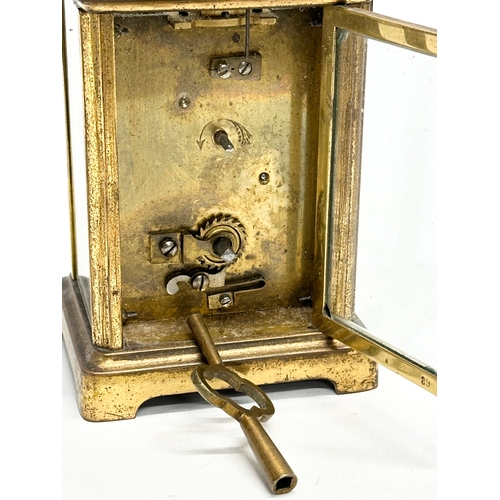 89 - Whytock & Sons. A Late 19th/Early 20th Century brass carriage clock by Whytock & Sons. With original... 