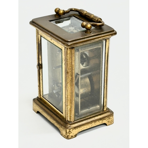 89 - Whytock & Sons. A Late 19th/Early 20th Century brass carriage clock by Whytock & Sons. With original... 